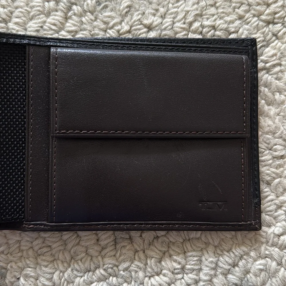 Tumi Black Leather Double Billfold Wallet with Coin Holder.